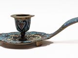 a picture of a blue and gold tea cup and saucer