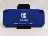 a blue nintendo switch case sitting on top of a white table