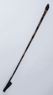 a close up of a hockey stick on a white surface
