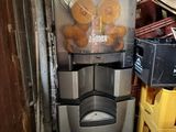 an image of a machine that has some donuts in it