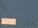 a small piece of paper on the side of a blue wall