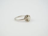a close up of a ring with a stone in it