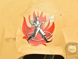 a sticker of a baseball player on the side of a train