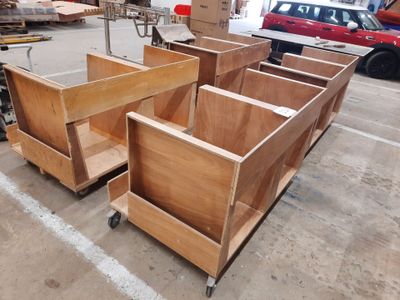 several pieces of wood are stacked on top of each other