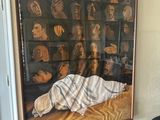 a picture of a painting on the wall of a living room