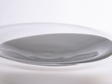 a white bowl that is sitting on a table