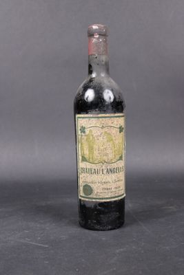 a bottle of wine that is sitting on a table