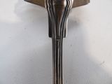 a spoon with a spoon rest on it on a table