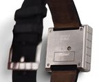 an image of a watch with a leather band