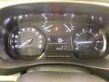 a close up of a car dashboard with a speedometer