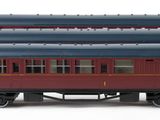 a red and blue train car on a white background