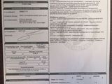 a close up of a security check sheet on a table