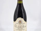 a bottle of wine that is sitting on a table