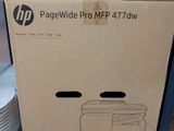 a cardboard box with a picture of a printer on top of it
