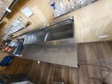 an overhead view of a kitchen with stainless steel appliances