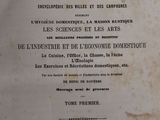 an old book with french writing on it sitting on top of a table