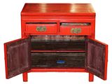 a red cabinet with two doors open on a white background