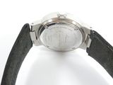 an image of a close up of a wrist watch on a white surface