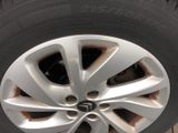 the tire of a car with a flat tire on it