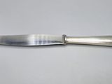 a knife that is sitting on a table