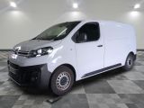 a picture of a white van on a checkered floor