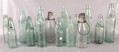 a lot of empty bottles that are sitting on a table