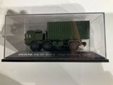 a toy truck with a box on the back of it
