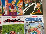 a lot of comic books on the table