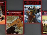 four books that are on the wall of a room