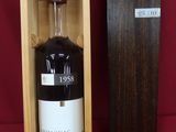 an image of a bottle of liquor in a wooden box