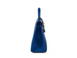 a blue handbag on a white background