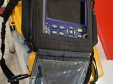 a bag that has a cell phone in it