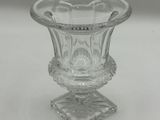 an image of a clear glass vase on a table