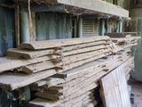 many pieces of wood stacked on top of each other