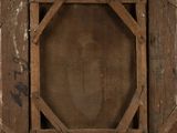 an old wooden picture frame with a small window in the middle of it