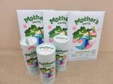 three cans of mother ' s earth yogurt sitting on a table