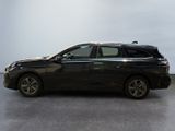 a picture of a black car parked in a parking lot