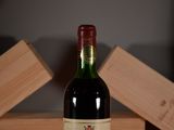 a bottle of wine that is sitting on a table