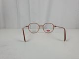 a close up of a pair of glasses on a white surface