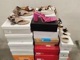 boxes stacked on top of each other with shoes on them