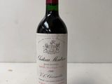 a bottle of wine that is sitting on a table