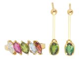 trois paires de boucles d'oreilles ornées de pierres de différentes couleurs sur fond blanc