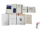 a lot of books that are sitting on a table