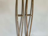 pair of antique cast iron crutts with wooden handles