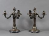 pair of antique silver plated candelabs on stands