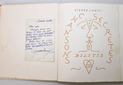 an open book with writing on it with a picture of a person