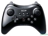 the wii controller is black and has four buttons on each side of it