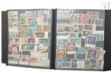 a black folder with a lot of stamps on it