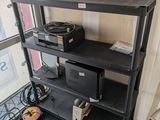 a shelf that has a record player on top of it