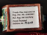 a close up of a ring with a label on it